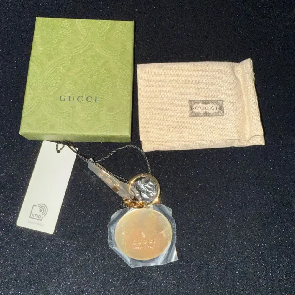 Brand new with box and dustbag Gucci Gold and Green Keychain